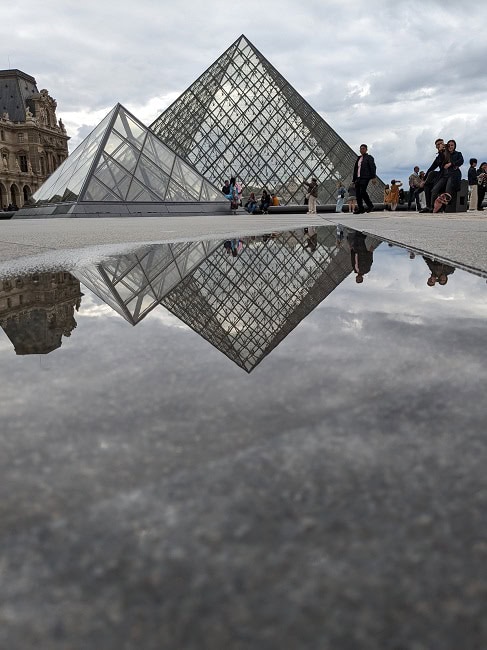 A Louvre pyramids reflection picture