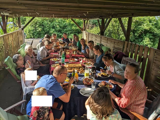 Having dinner at one of the family gathering (already had a lot of food throughout that day and more food after dinner)