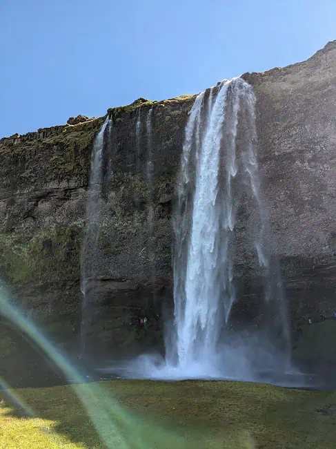 Seljalandsfoss. As you can see from the picture, you could walk behind the falls and so we did