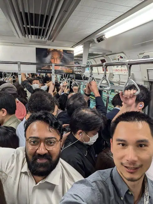 My co-worker and I while on the commuter train. More people got on after I took this picture. It was pretty crammed!